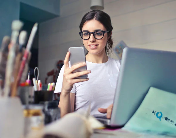 Girl On Phone In Art Studio